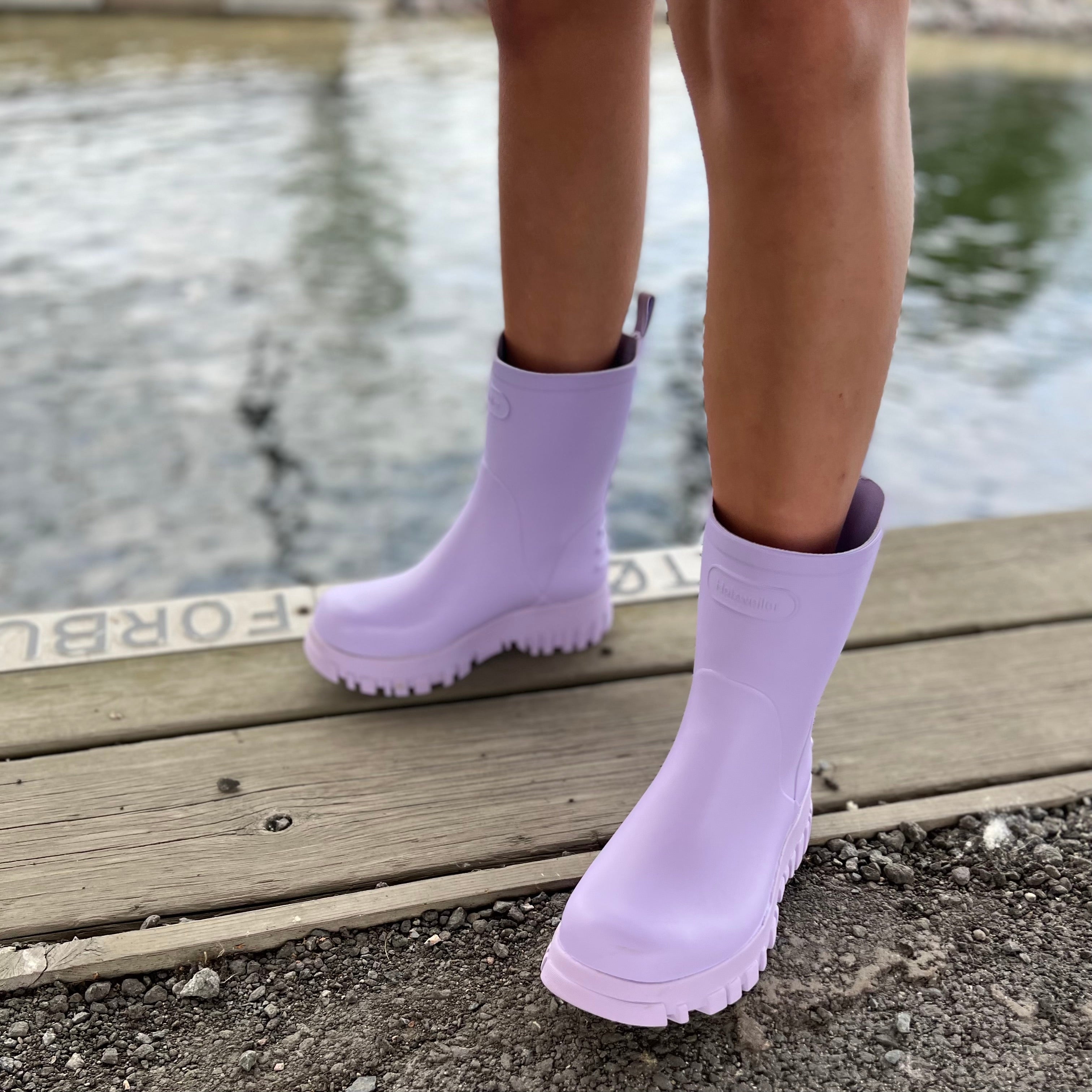 header photo for the "boots collection" with a picture of purple rubber boots